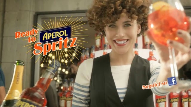 Aperol advertising scene with an orange spritz cocktail